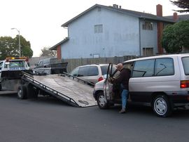 Getting a car on a flat bed tow truck